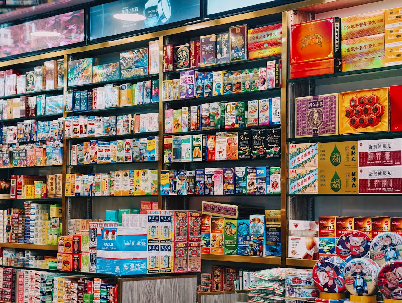 Bright and colorful display of various Asian products on supermarket shelves.
