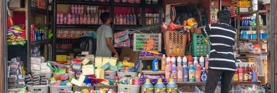 Vibrant street shop in Colombo selling cleaning products and household items.